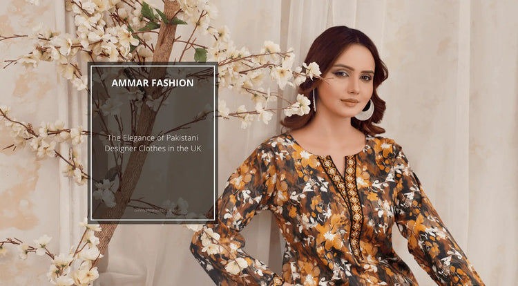 a girl in black and yellow beautifully mesh printed pakistani suit, sitting with a wall alongside a pant of white lilies with flowers on it.